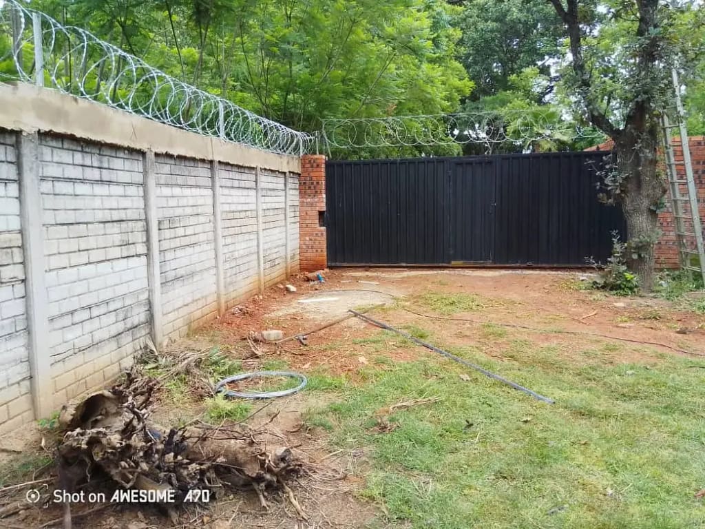 Wave Razor Top On Gate Razor wire installation – TSG Projects Zimbabwe